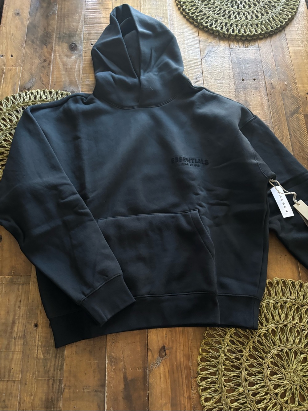 Essentials Black Pullover Hoodie with Subtle Chest Logo